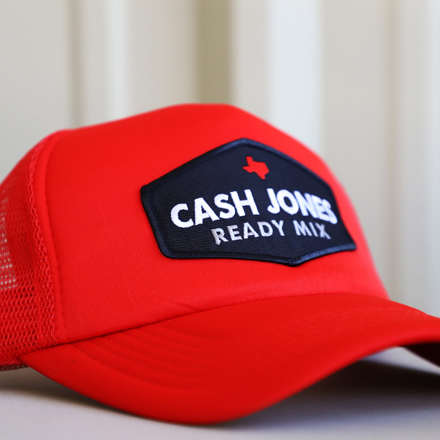 CJ - Jones Patch Red Foam Trucker